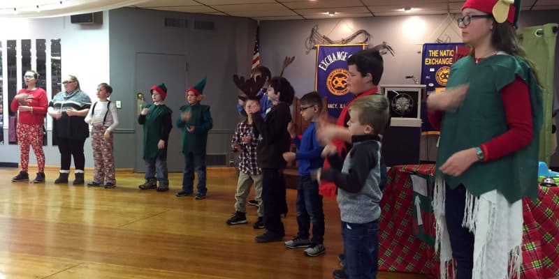 Kids and Christmas Kids signing Christmas carols