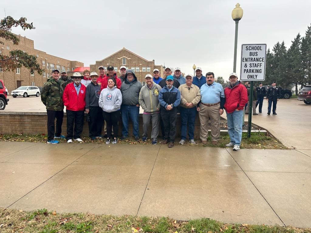 Veterans Day Parade, November 9, 2024 - QSC Members marching parade with American flag